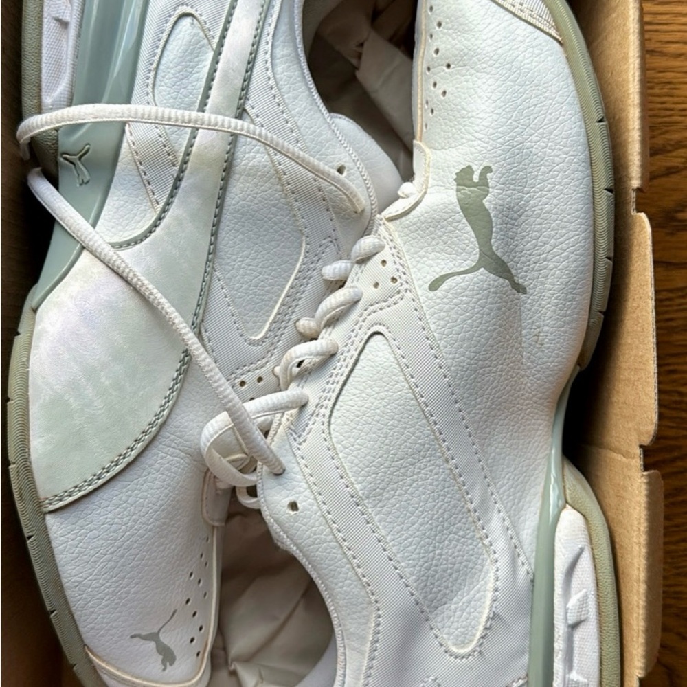 Puma women’s White and Gray Sneakers